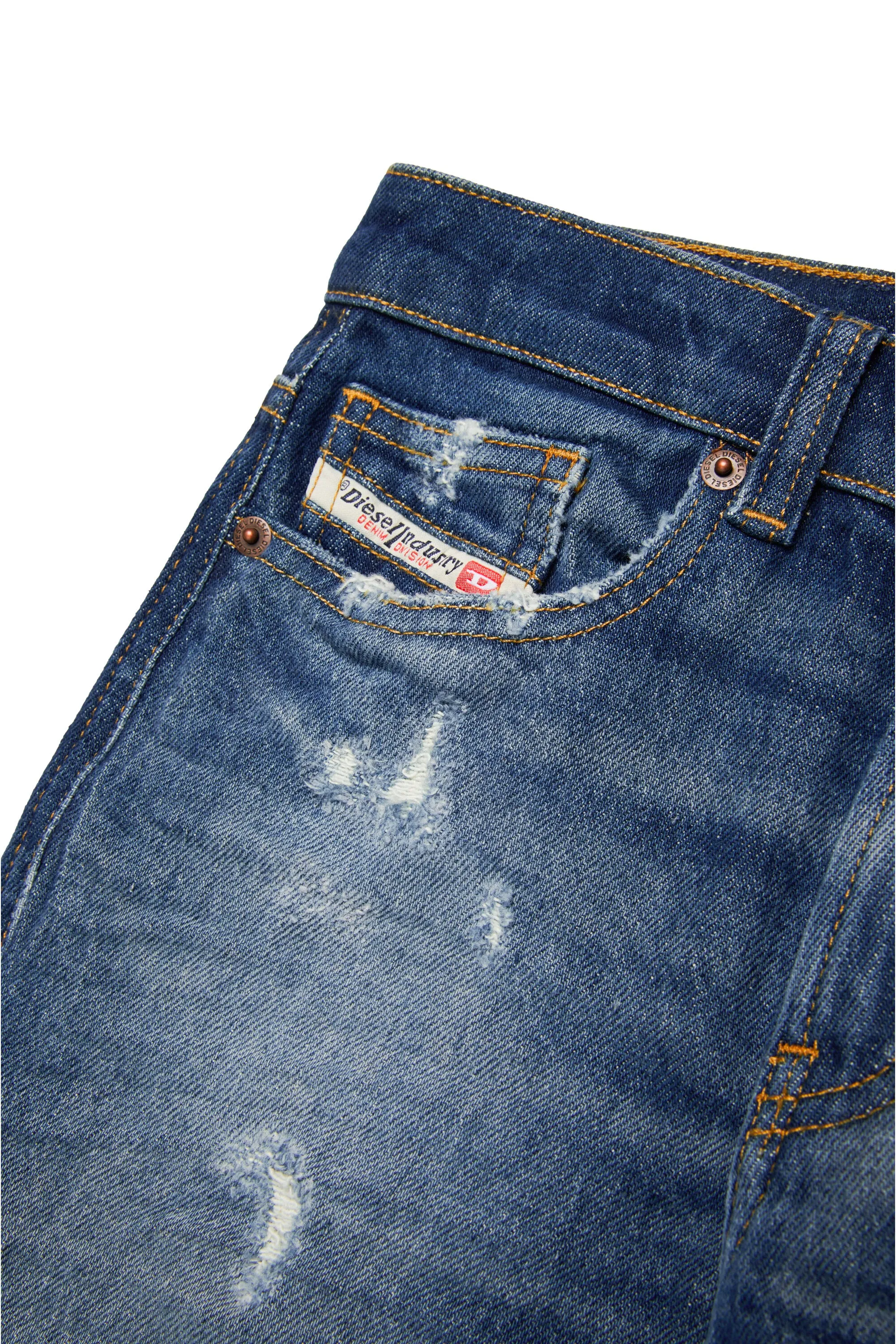 Mid blue tapered jeans with abrasions - D-Lucas