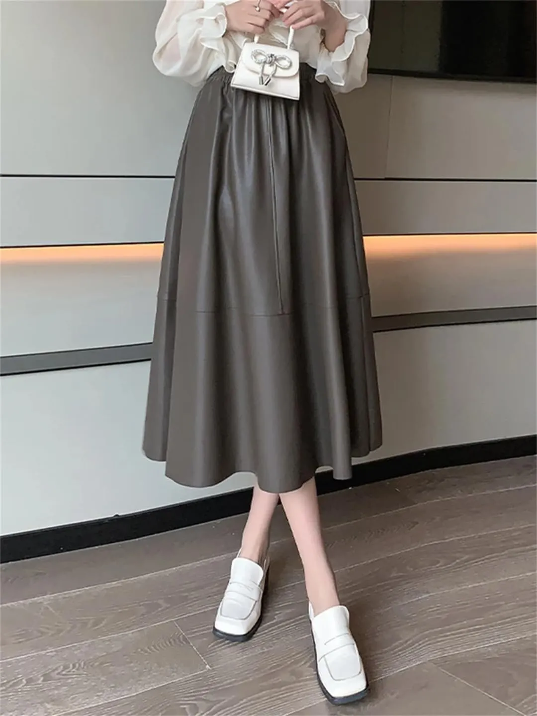 Women Elegant Soft PU Leather High Waist Loose Office Black Midi A-Line Skirts